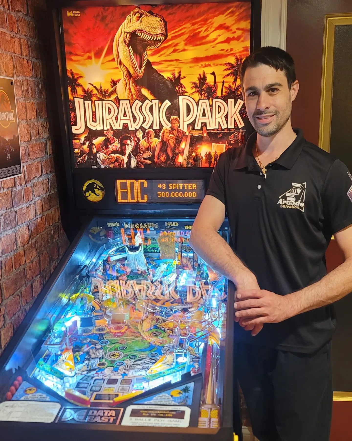 Standing near Repaired Pinball Machine